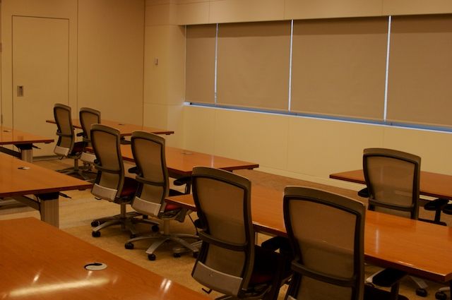 Weill Greenberg Center Room with Tables and Chairs